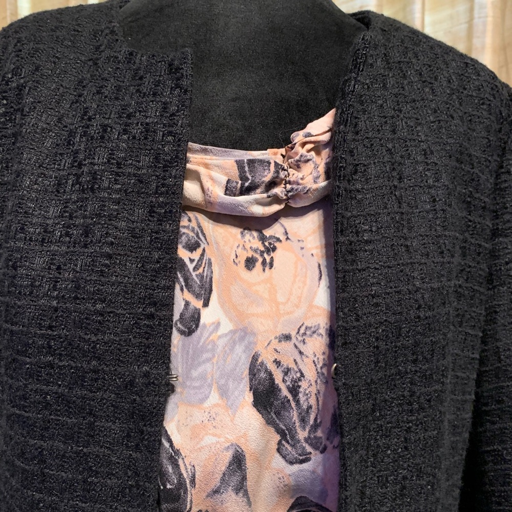 Two piece suit with sleeveless top